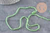 Perles cristal toupies à facette vert transparent 3-3.3mm, x1 fil de 38cm (G11111)