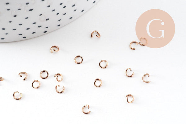 Anneaux ronds acier 304 inoxydable or rose PVD 4mm x0.7mm, x 50 (G10907)