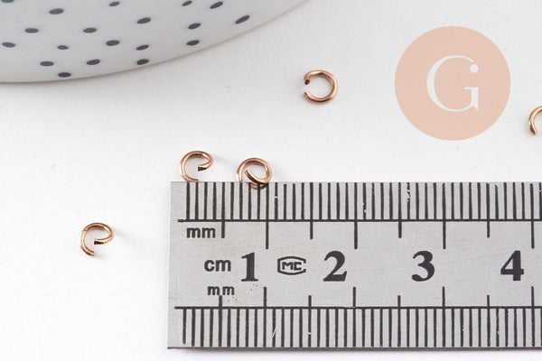 Anneaux ronds acier 304 inoxydable or rose PVD 4mm x0.7mm, x 50 (G10907)