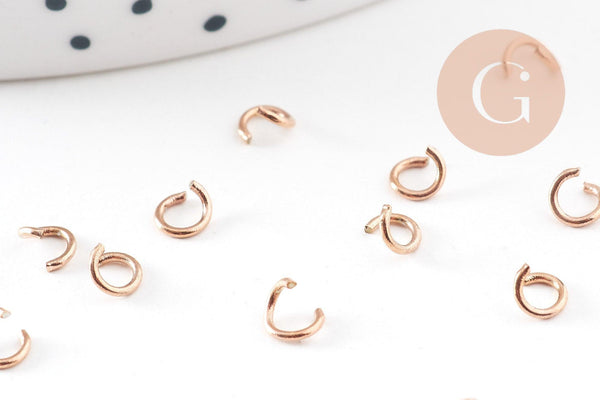 Anneaux ronds acier 304 inoxydable or rose PVD 4mm x0.7mm, x 50 (G10907)