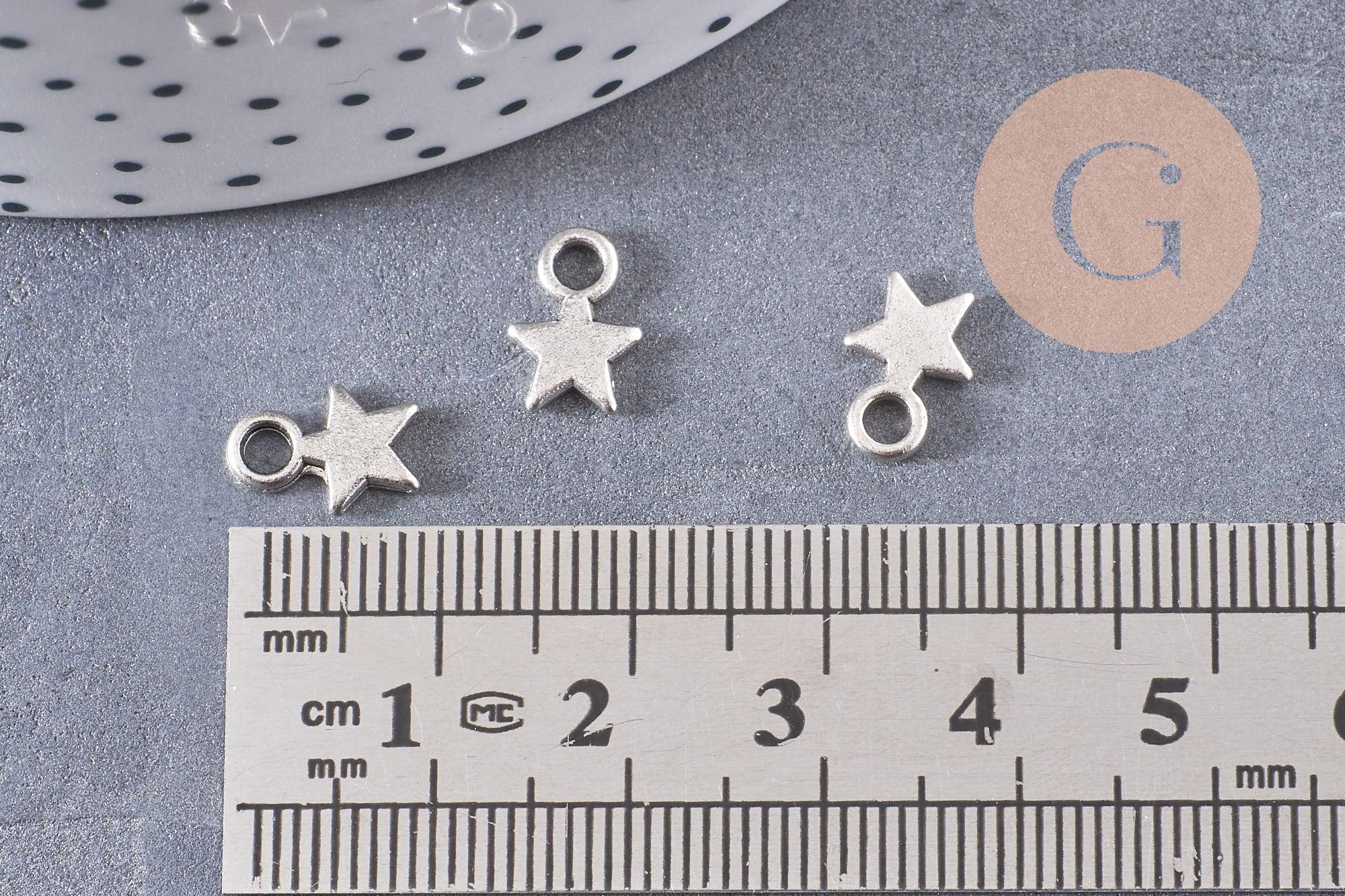 Breloques étoiles argentées , pendentif salace argenté 10mm, x50 (14gr) (G0059)