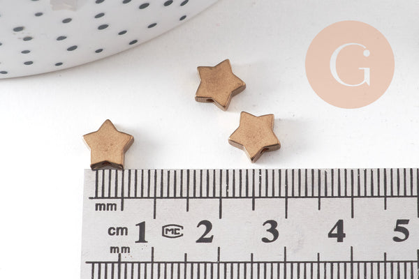 Breloques intercalaires étoiles laiton brut ,fournitures pour bijoux,sans nickel, breloques laiton brut,etoile,8mm, x 10 (G1581)