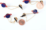 Broche pins double planète éclair doré émail ,broche dorée ,décoration veste,x1 G6381