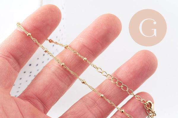 Chaine fine complète avec fermoir cuivre doré singapour 16K 1.3 mm-45cm, x1 (G0635)