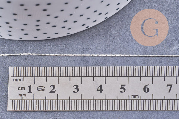 Chaine fine serpentine laiton platine 0.9 mm, x5 metres (G1409)