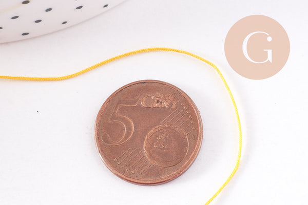 Cordon Jaune doré tressé polyester 0.6mm, x1 mètre (G10664)