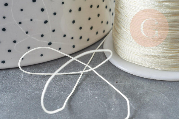 Cordon fil de jade nylon beige 0.5mm, fabrication bijoux avec nœud coulissant, x1mètre (G8947)