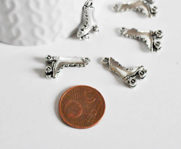 EP Breloques roller argent tibétain,fournitures créatives,argent tibétain,patin à roulettes, breloque argent, création bijoux, x 5,G2403