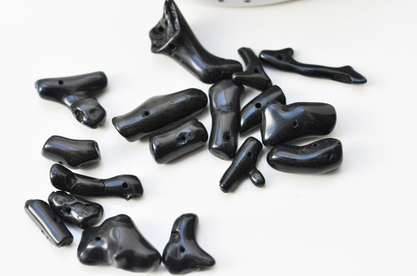 EP Perle branche corail noir percée naturel 15-25mm,x 10 G4073