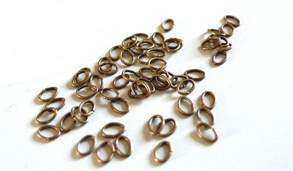 EP anneaux fins ovales bronze 4mm, x1 gramme (G2327)