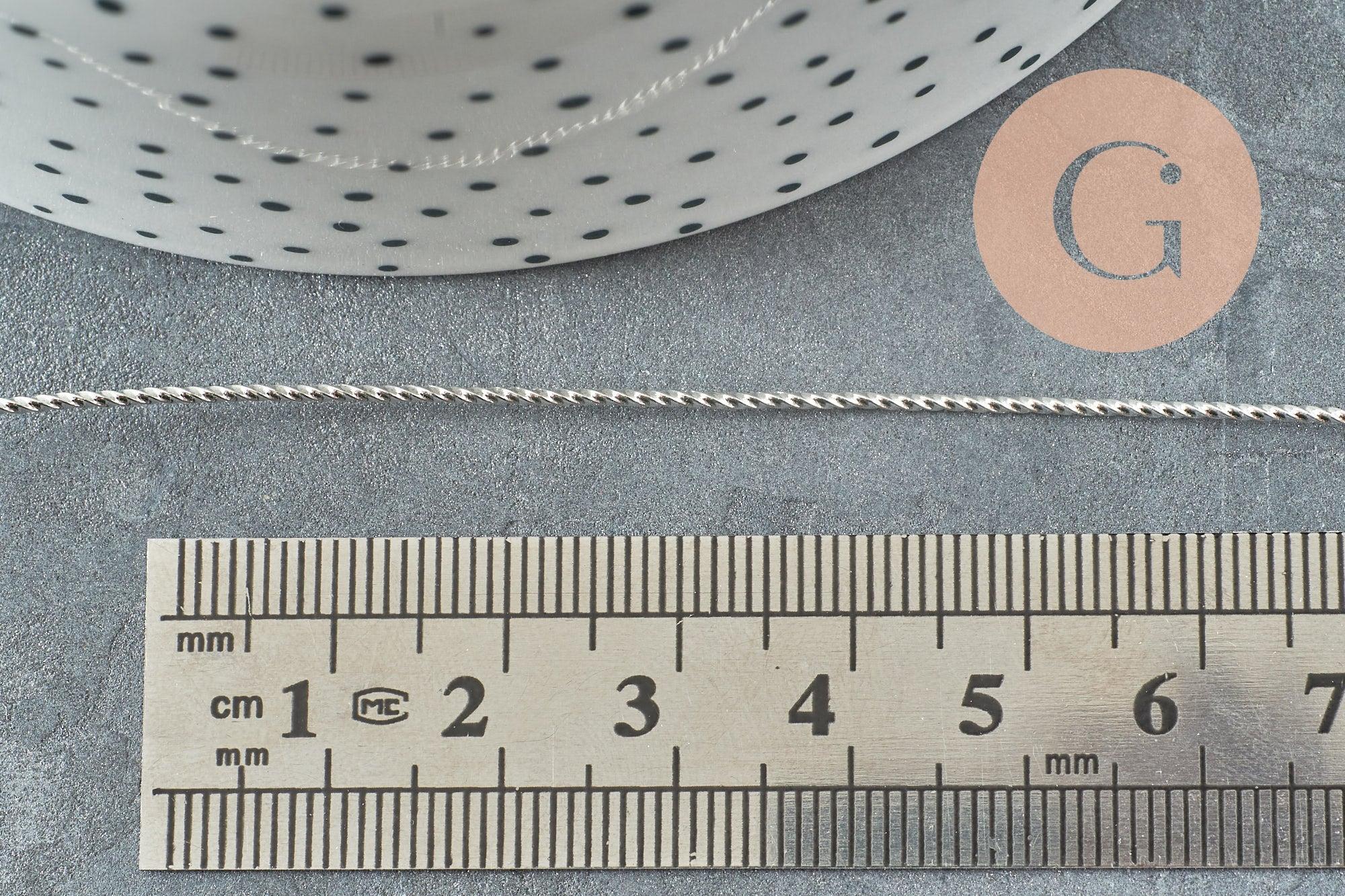 Fil métallique laiton argenté torsadé 0.8mm,x1 mètre G9640