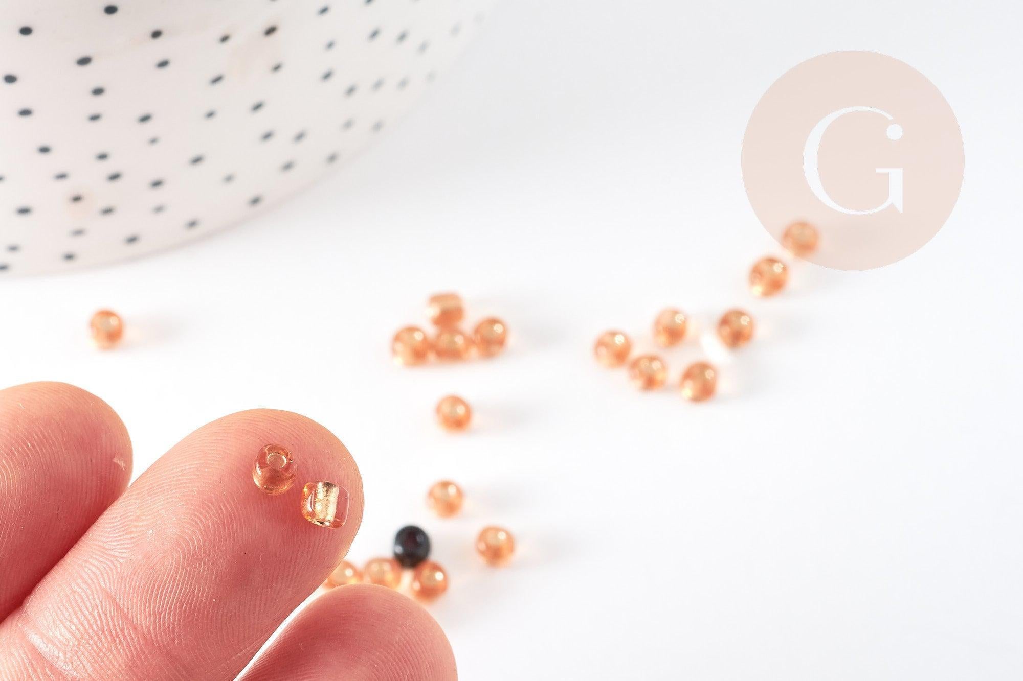 Grosses perles rocaille dorée transparent 4mm, x 10gr (G1401)