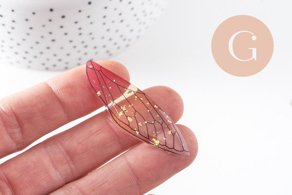 Pendentif aile résine paillettes,des peerles originales et transparentes pour création bijoux bois,51mm, x1 (G3923)