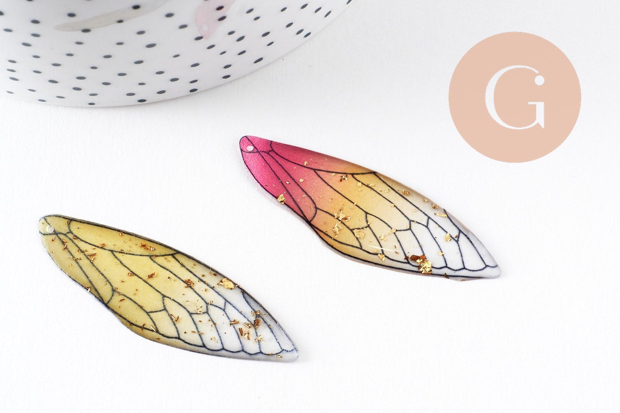 Pendentif aile résine paillettes,des peerles originales et transparentes pour création bijoux bois,51mm, x1 (G3923)