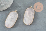 Rose-quartz stone pendant framed in gold bezel on dark surface, showcasing the Pendentif hexagone quartz rose naturel 49mm (G2506), emphasizing its boho-chic style.