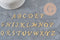 Pendentif lettre initiale acier inoxydable doré IP 20.5mm, x1 (G11375)
