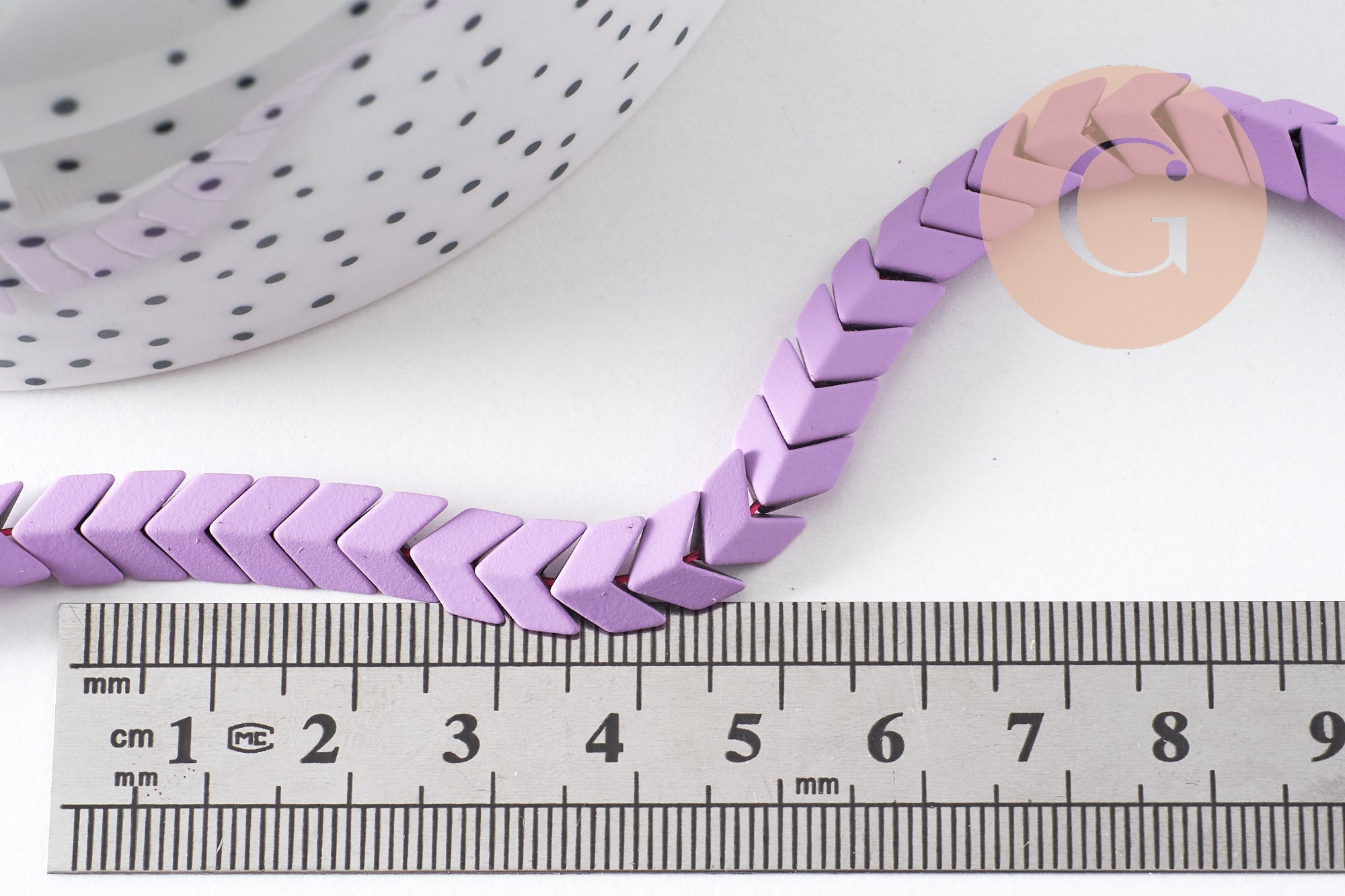 Perle chevron hématite colorée violet synthétiques 7mm, création bijoux pierre, x1 le fil de 40cm (G6898)