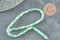 Perle nacre naturelle heishi vert pastel,tube coquillage coloré,perle coquillage,2x4mm, le fil de 20 cm, x1 (G5129)