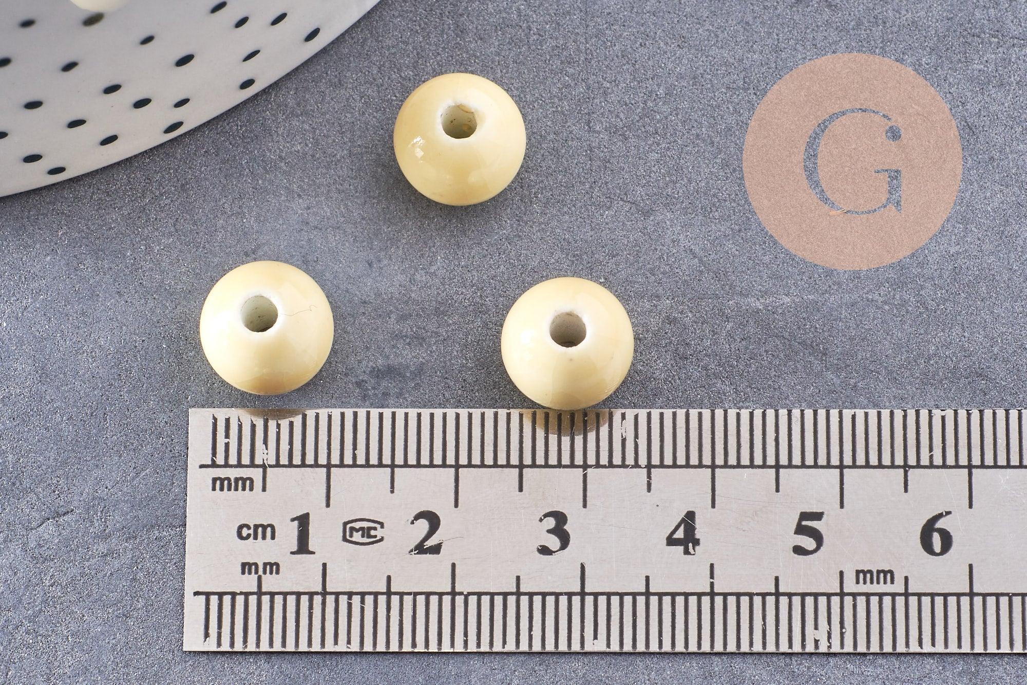 Perle porcelaine jaune pâle, perle ronde, création bijoux, 11m, x5 (G1370)