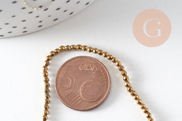 Perle ronde facetté hématite dorée 2mm, x1 fil 39.8cm (G4428)