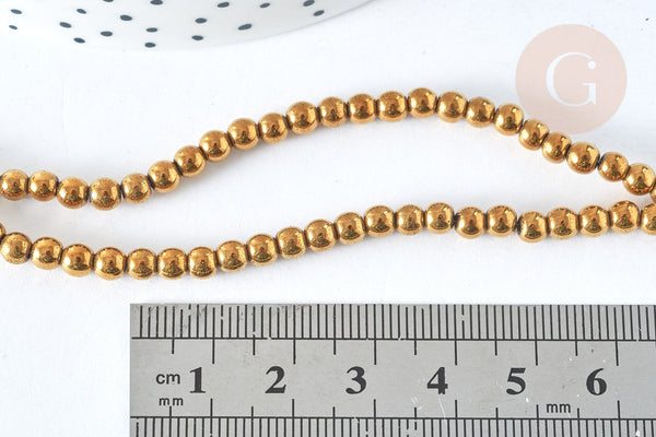 Perle ronde hématite de synthèse dorée 4mm, perle pierre, le fil de 39cm, x1 (G7404)