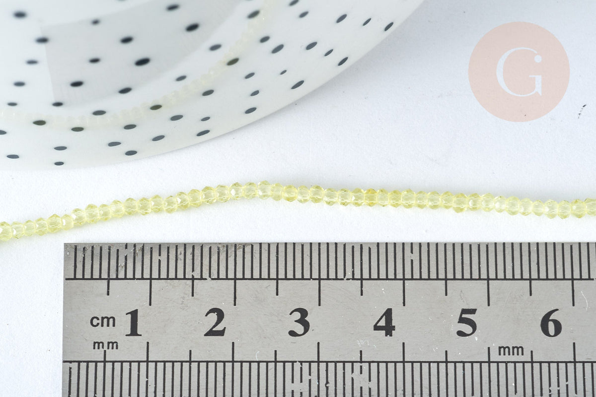 Perle ronde verre facettée transparente jaune clair, 2~2,5mm, x1 fil de 37cm (G7335)