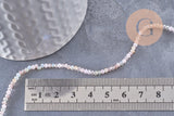 Perle rondelle cristal beige rose 2mm, x1 fil de 32cm (G10111)