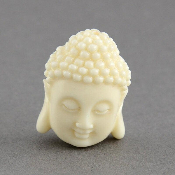 Perle tête de bouddha résine blanche 20mm,perle imitation corail en résine, x2 (G4985)
