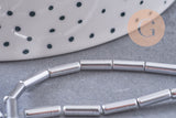 Perle tube hématite argentée 9.5mm, x1 fil de 19cm (G4484)