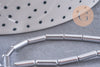 Perle tube hématite argentée 9.5mm, x1 fil de 19cm (G4484)