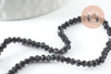 Perles cristal toupies Ă facette noir 2x3mm, x1 fil de 49cm (G4670)