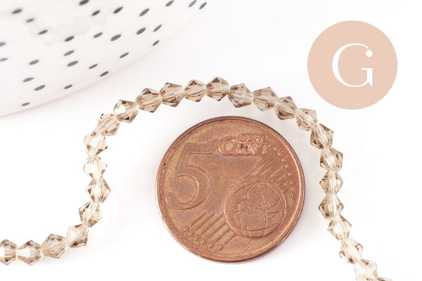 Perles cristal toupies facette beige transparent 3mm,fil de 36cm, x1 (G2598)