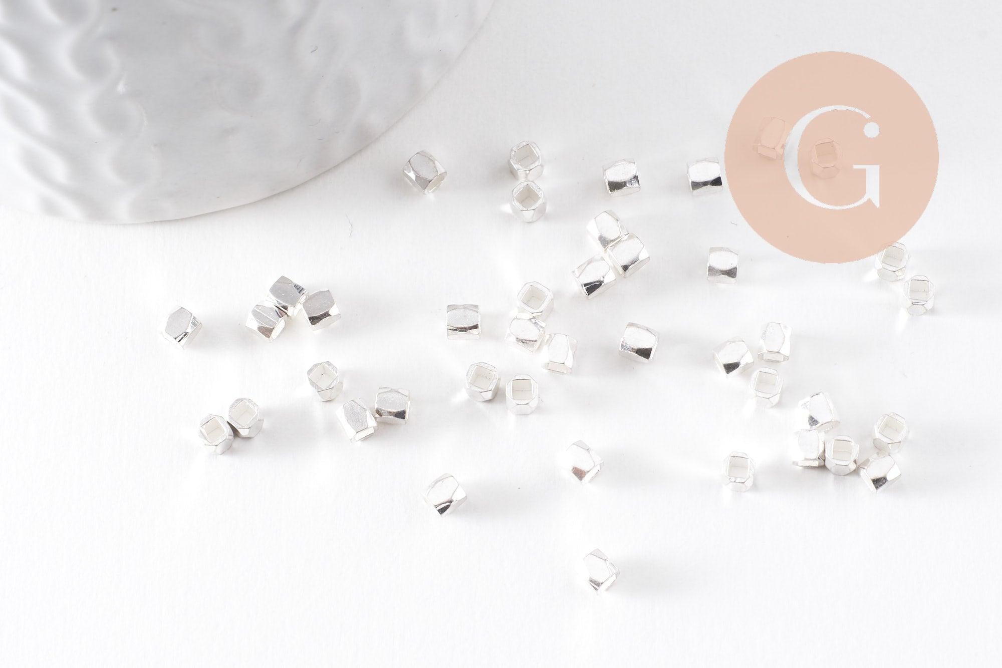 Perles intercalaires facettées laiton argenté ou doré, 3x3mm, x50 (G9906)