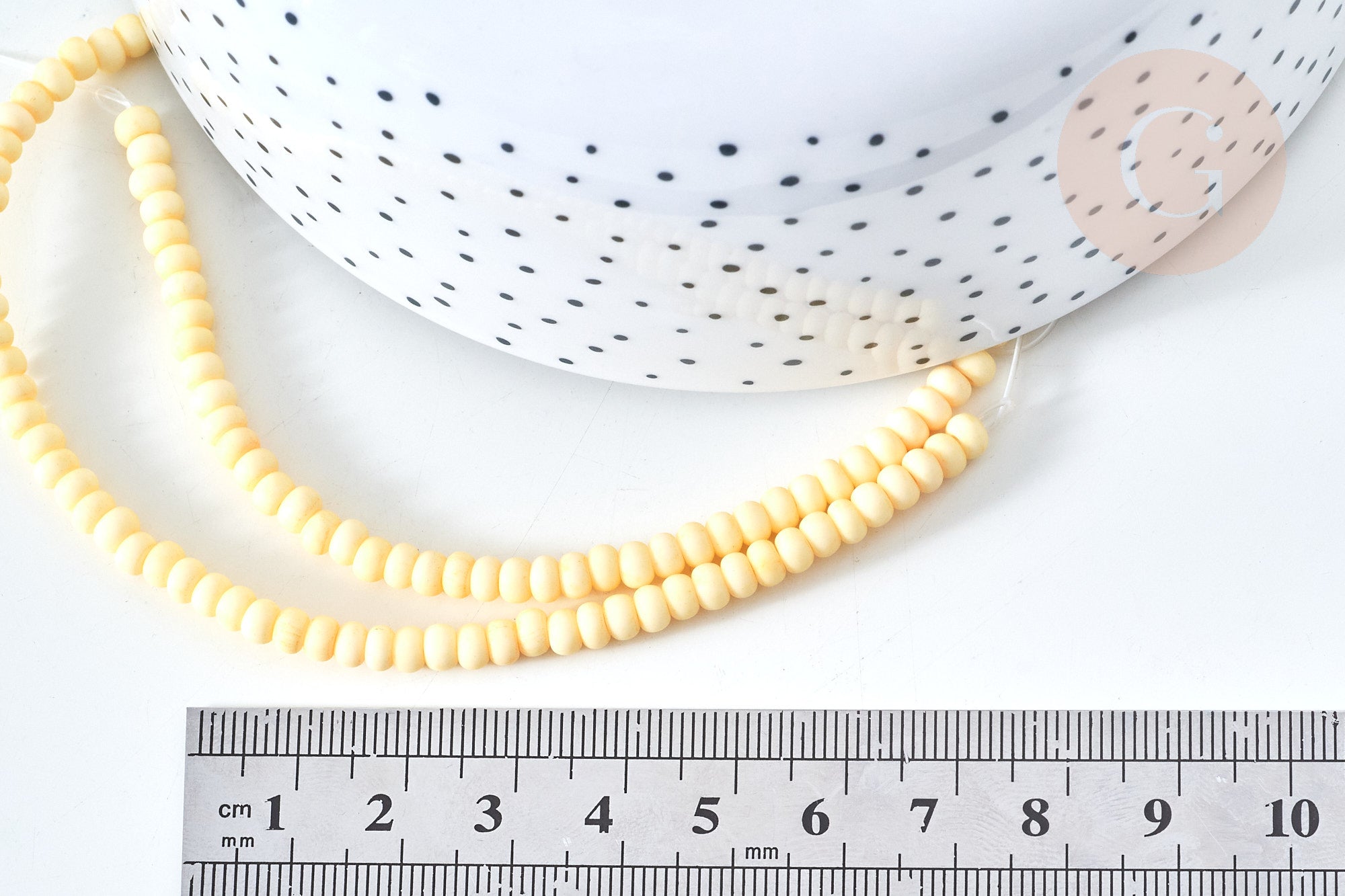 Perles porcelaine abacus jaune pastel 4x3mm, fil de 38cm, x1 (G7809)