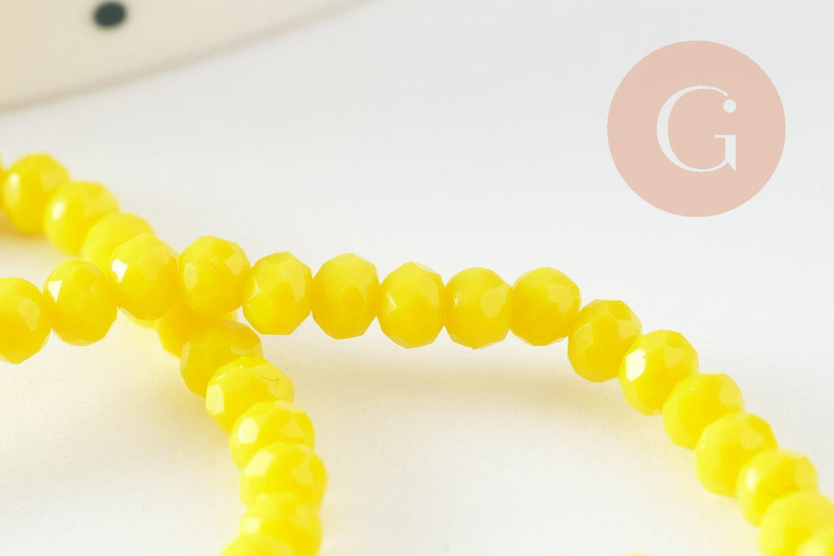 Perles rondelles verre jaune opaque facette 3x2mm, x1 fil de 32cm (G8256)