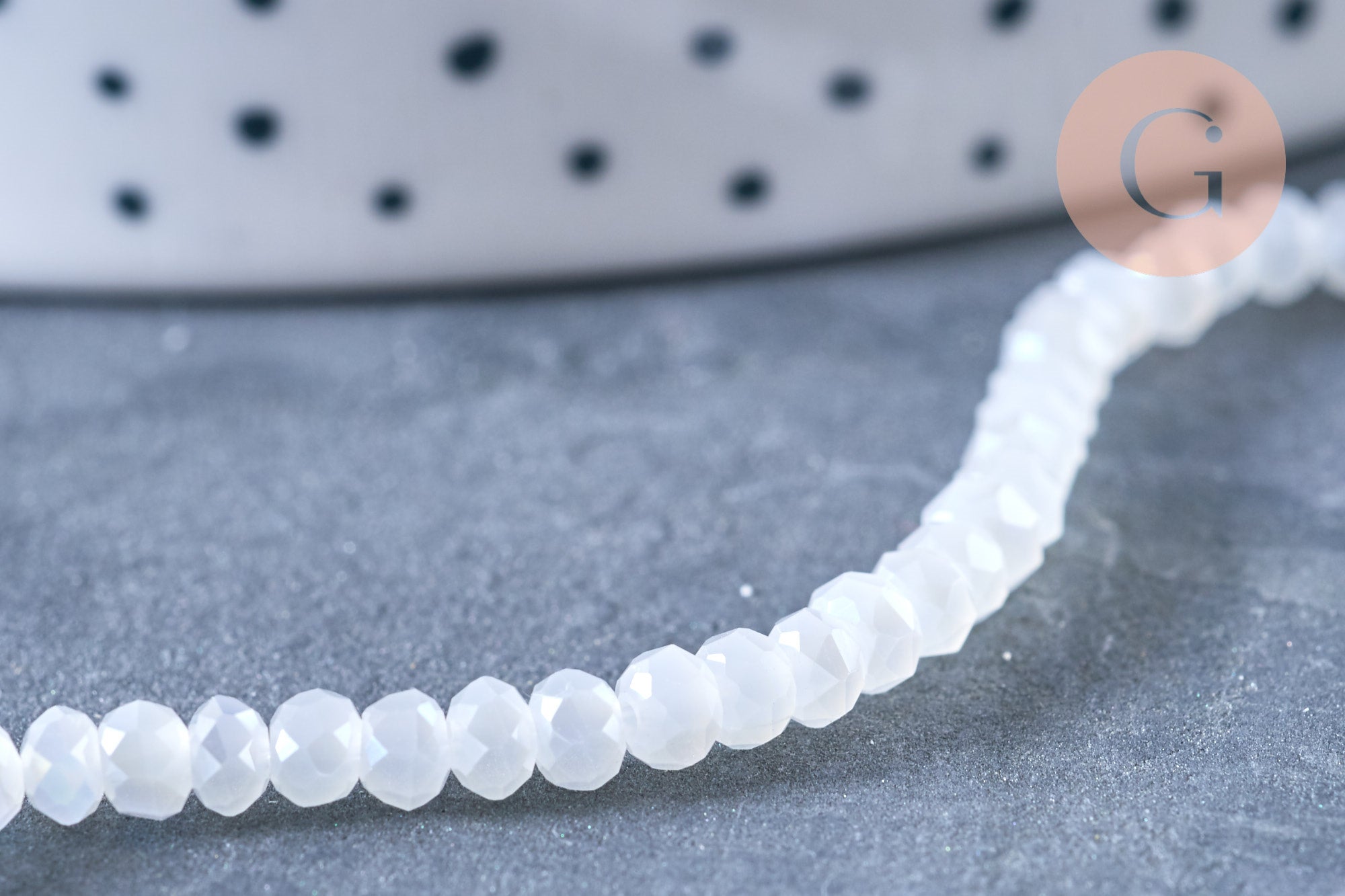 Perles toupies cristal blanc irisé 3.5x2.5mm, fil 25.4cm x1 (G6763)