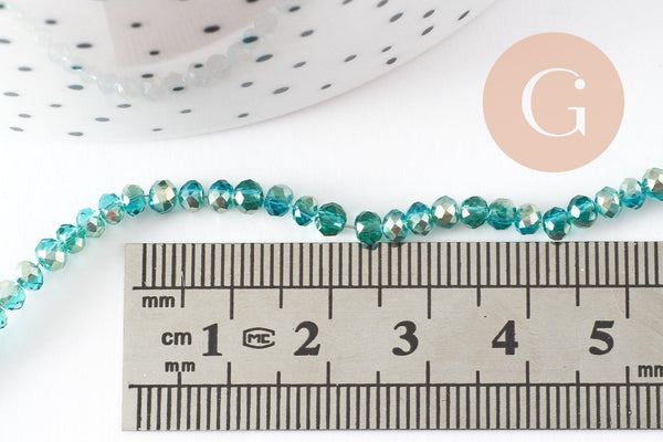 Perles toupies cristal bleu turquoise transparent irisé 3.5x2.5mm, x1 fil de 40cm (G6760)