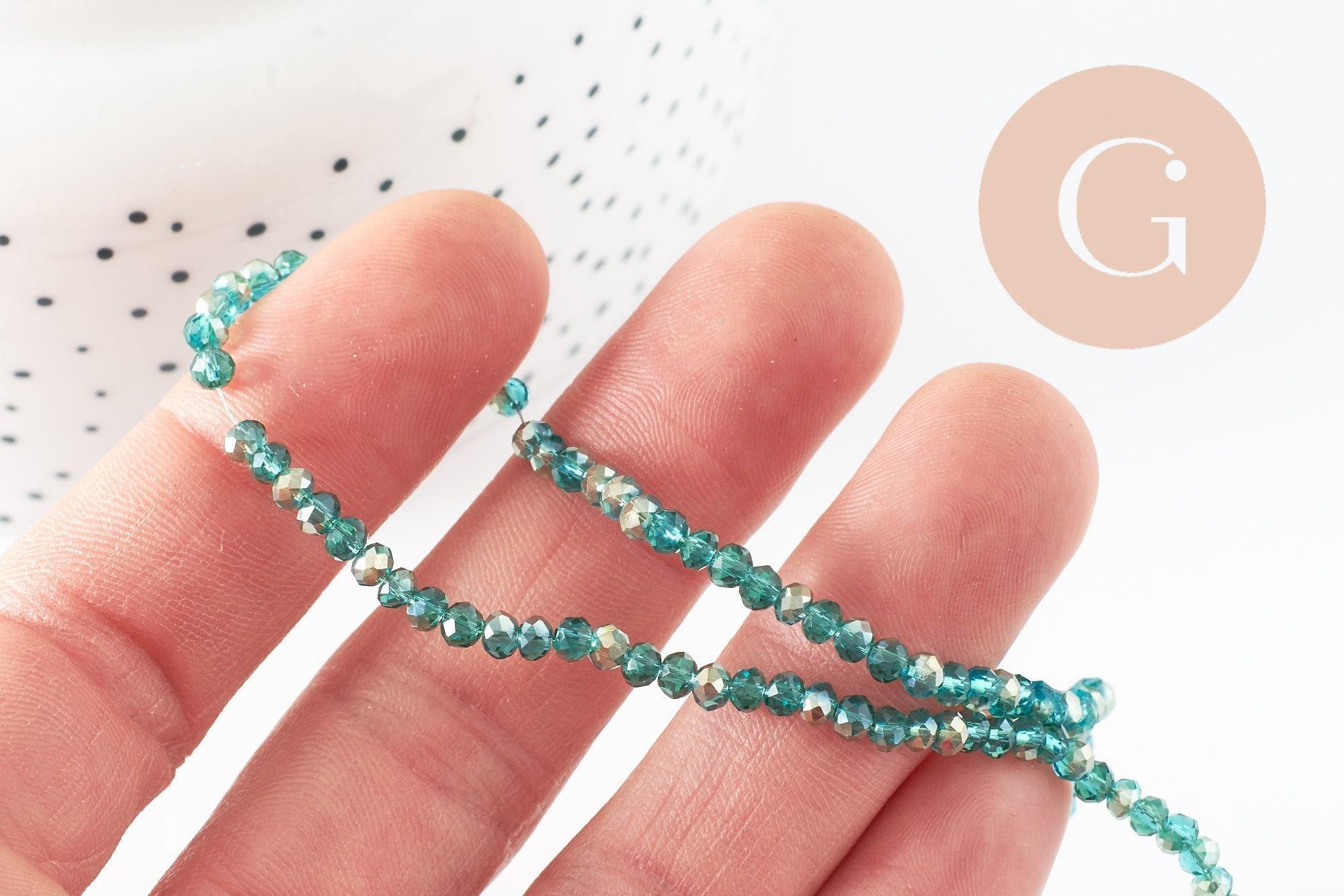 Perles toupies cristal bleu turquoise transparent irisé 3.5x2.5mm, x1 fil de 40cm (G6760)