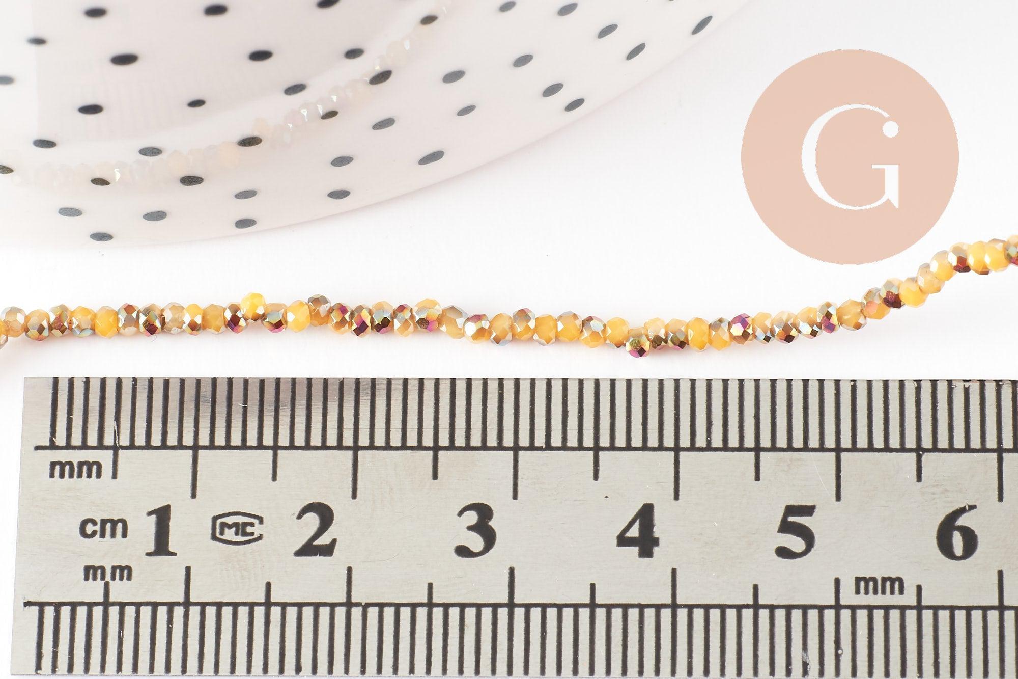 Perles toupies cristal jaune irisé, perles bijoux, perle cristal, Perle verre facette,fil de 26cm, 2mm, x1 (G4506)