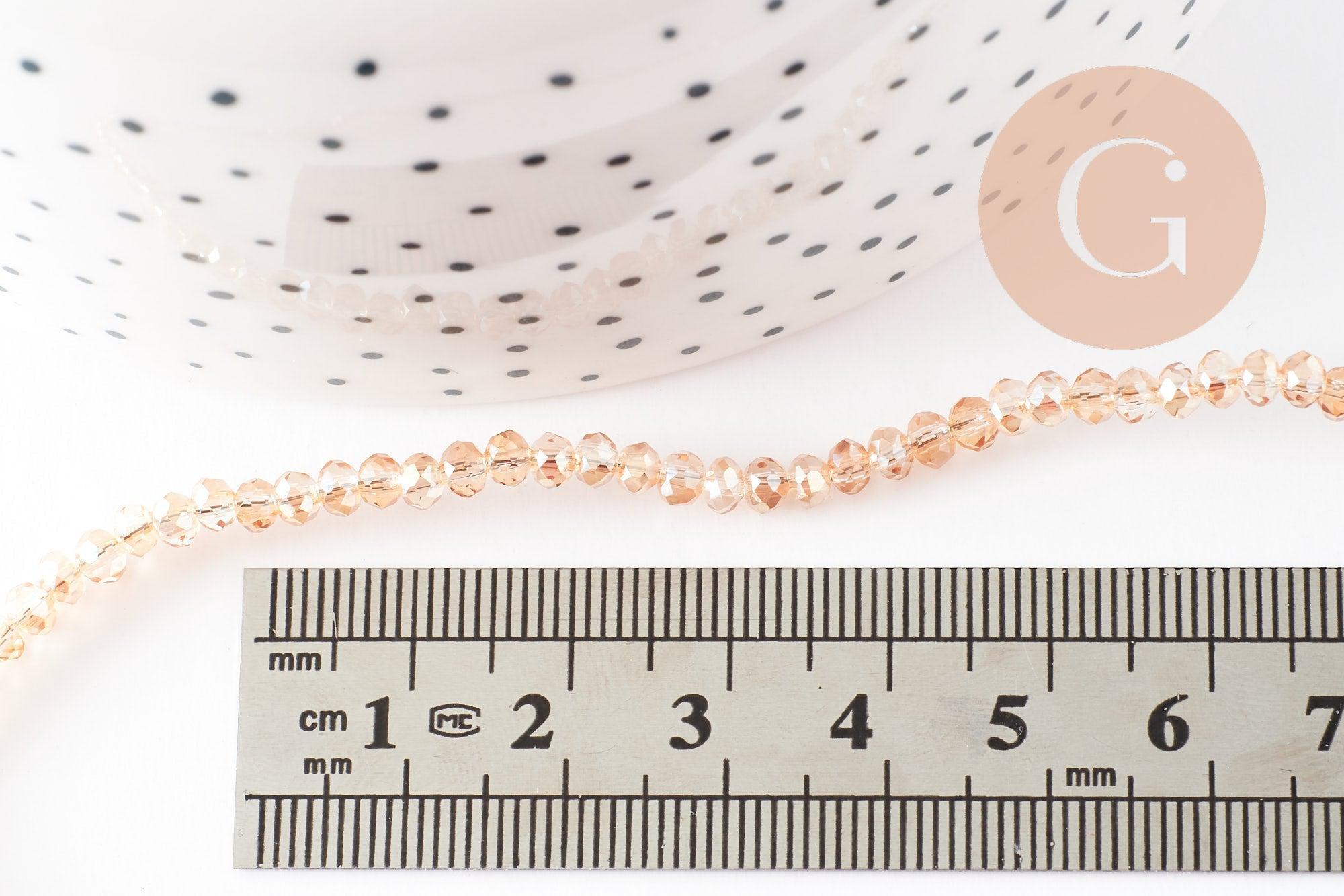 Perles toupies cristal orange transparent irisé 3.5x2.5mm, x1 fil 25cm (G8595)