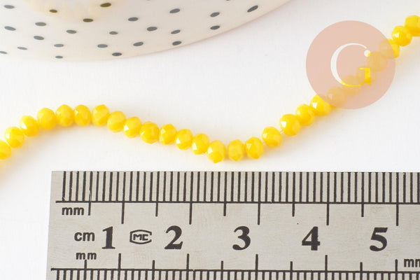 Perles toupies verre jaune facette 3mm, x1 fil de 38cm (G2669)