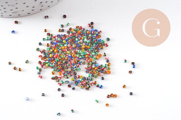 Petite Perle rocaille rayé multicolore 1.5x2mm x 10gr (G10934)