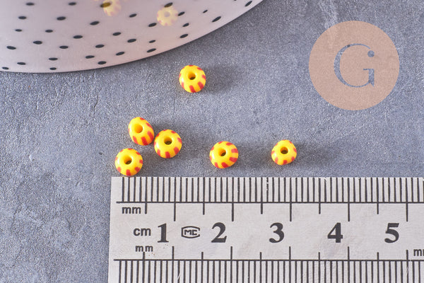 Petite perle rocaille verre rayé jaune rouge 3x4.5mm, x10 Gr (G10683)