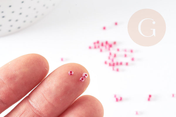 Petite perles de rocaille rose transparent 2.5mm, x 10gr (G2371)