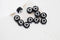 perle ronde coeur blanc plastique noir,perle plastique,perle ronde lettre,création bijoux, x 10Gr (G2490)