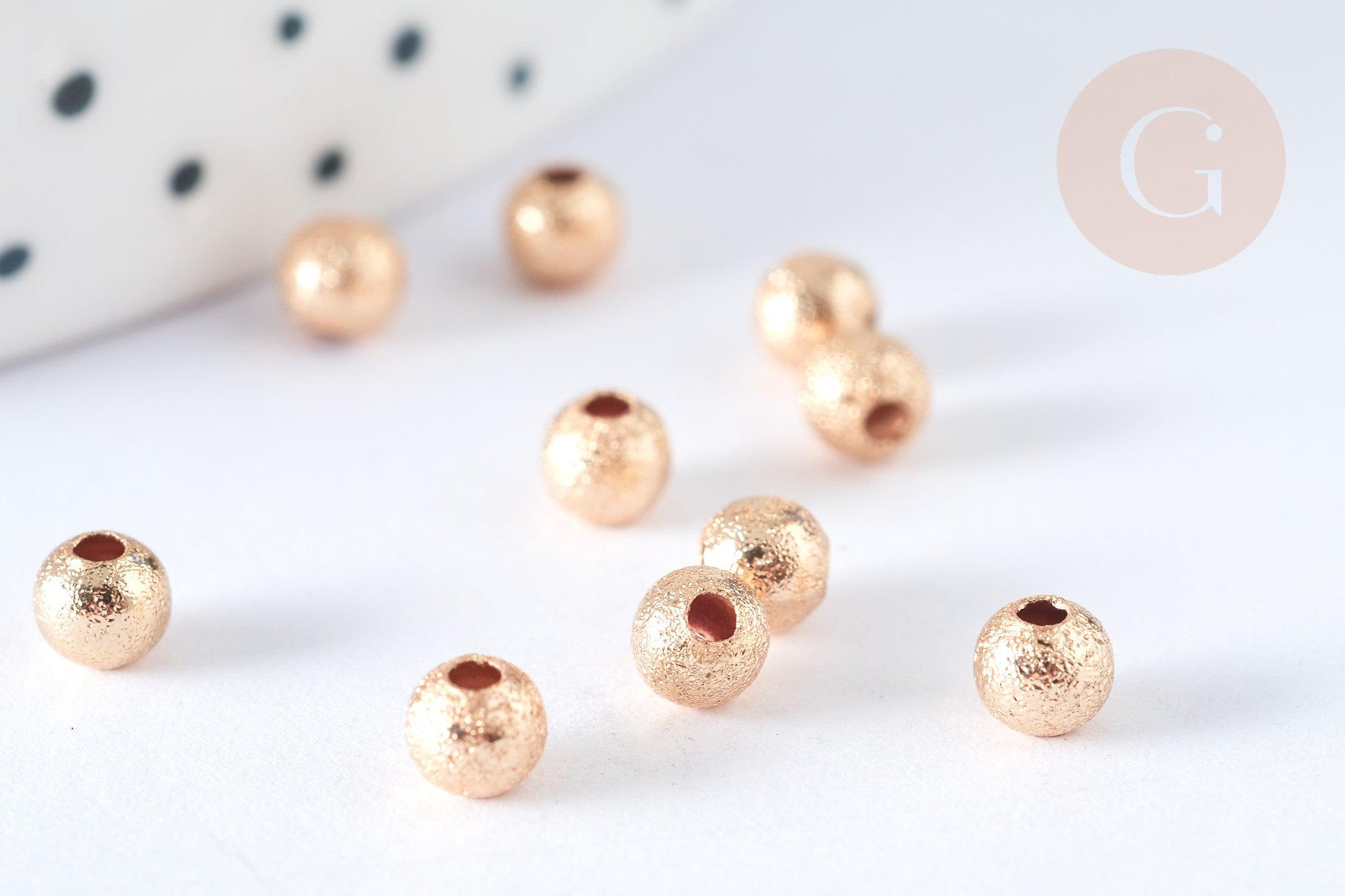 Perles intercalaires rondes dorées texturées pour bijoux DIY.