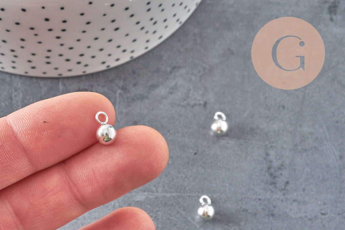 Goutte de finition acier inoxydable argenté 10x6mm, x10 VALIDE-Breloques et pendentifs-Gingerlily Perles