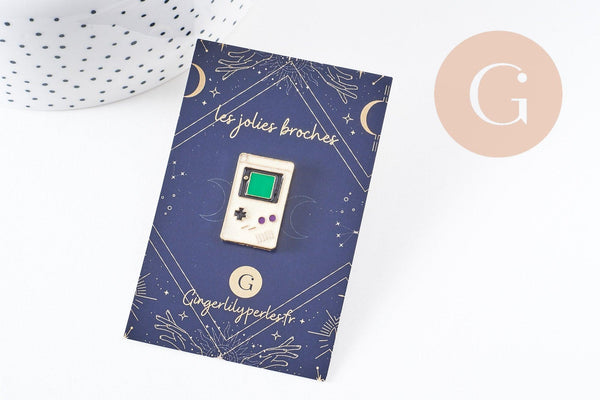 Broche pins console portable jeux vidéos doré émail noir 24x15mm, x1 (G5899)