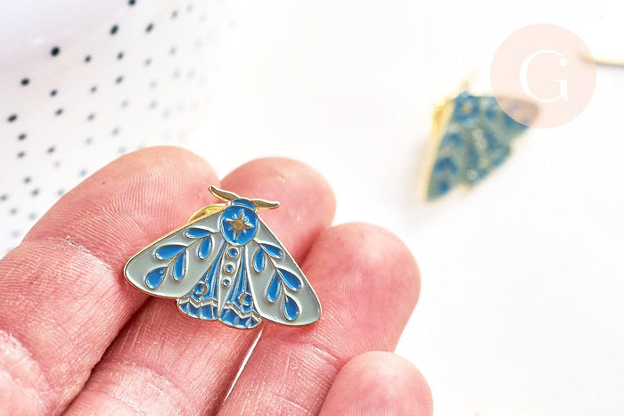 Broche pins papillon mystique doré émail bleu 27.5x18mm, x1 (G5547)