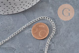 Chaîne maille courbe en acier inoxydable 304 argenté 4x3mm, à côté d'une pièce de 5 centimes.